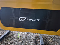 A close-up of the McConnel 67 Series hedge cutter with a black and yellow color scheme, showcasing the brand name.